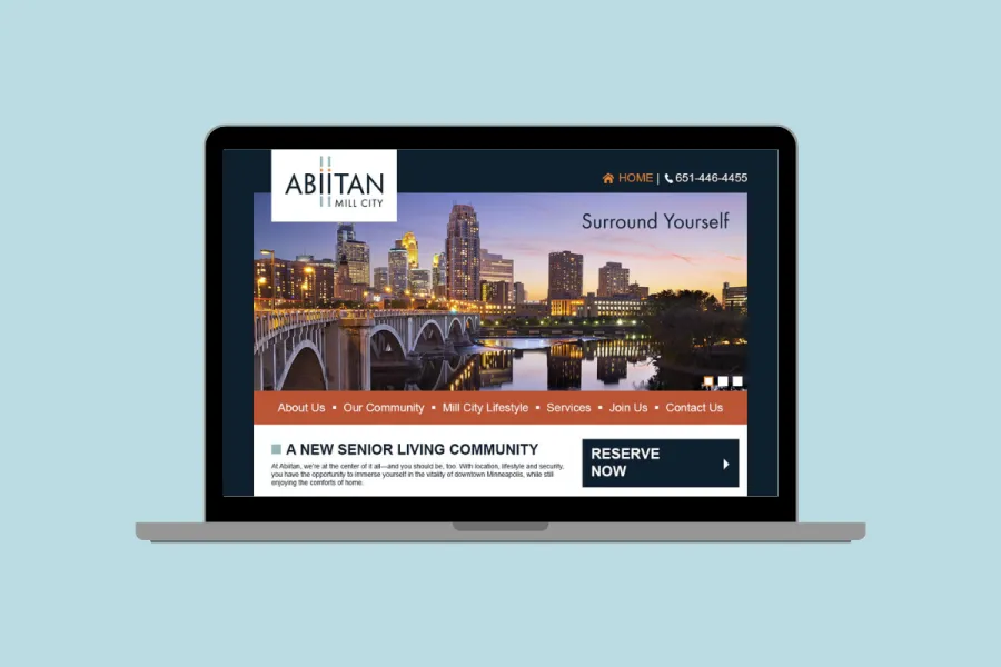 Rendering of the Abiitan homepage design on a laptop screen.